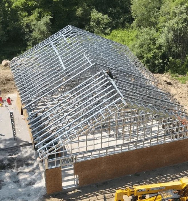 Aerial view of steel frame barndominium construction in Michigan
