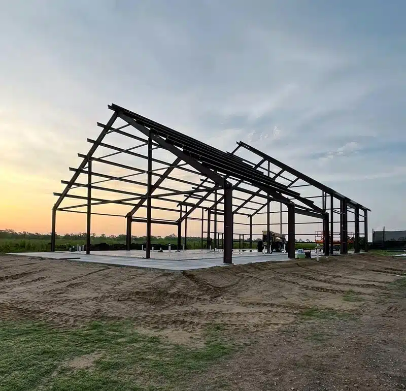 Barndominium frame at sunset in Michigan